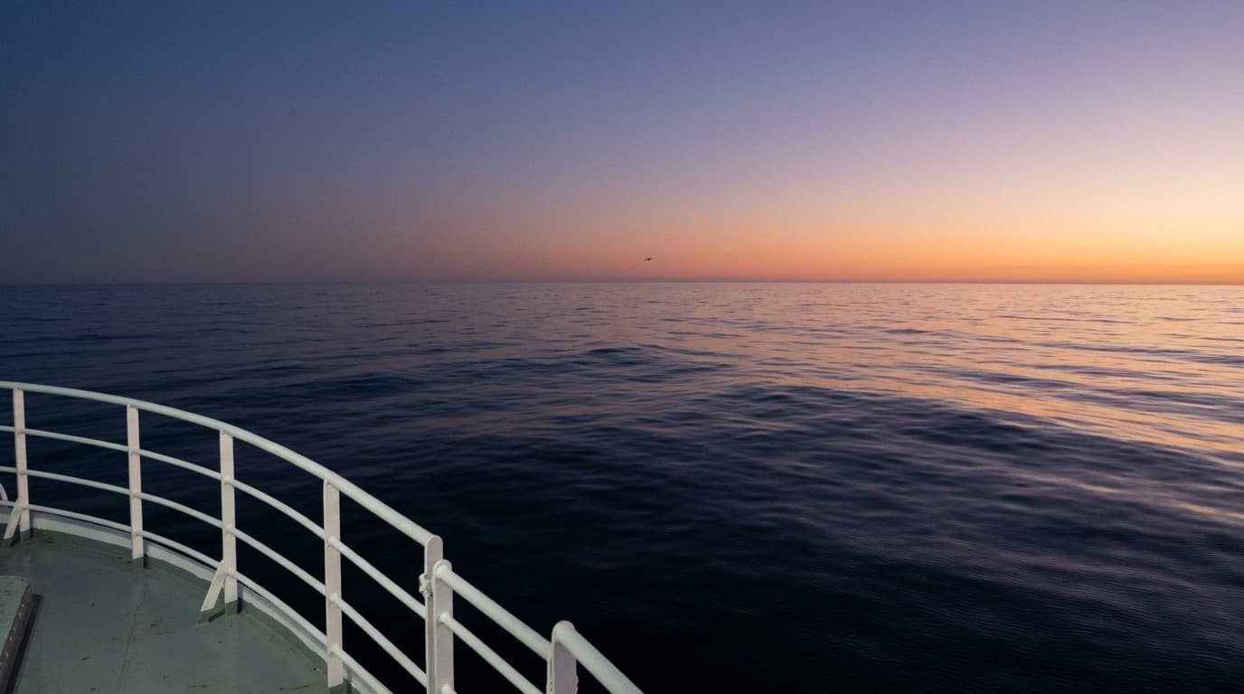 The open Atlantic at dusk seen from the deck